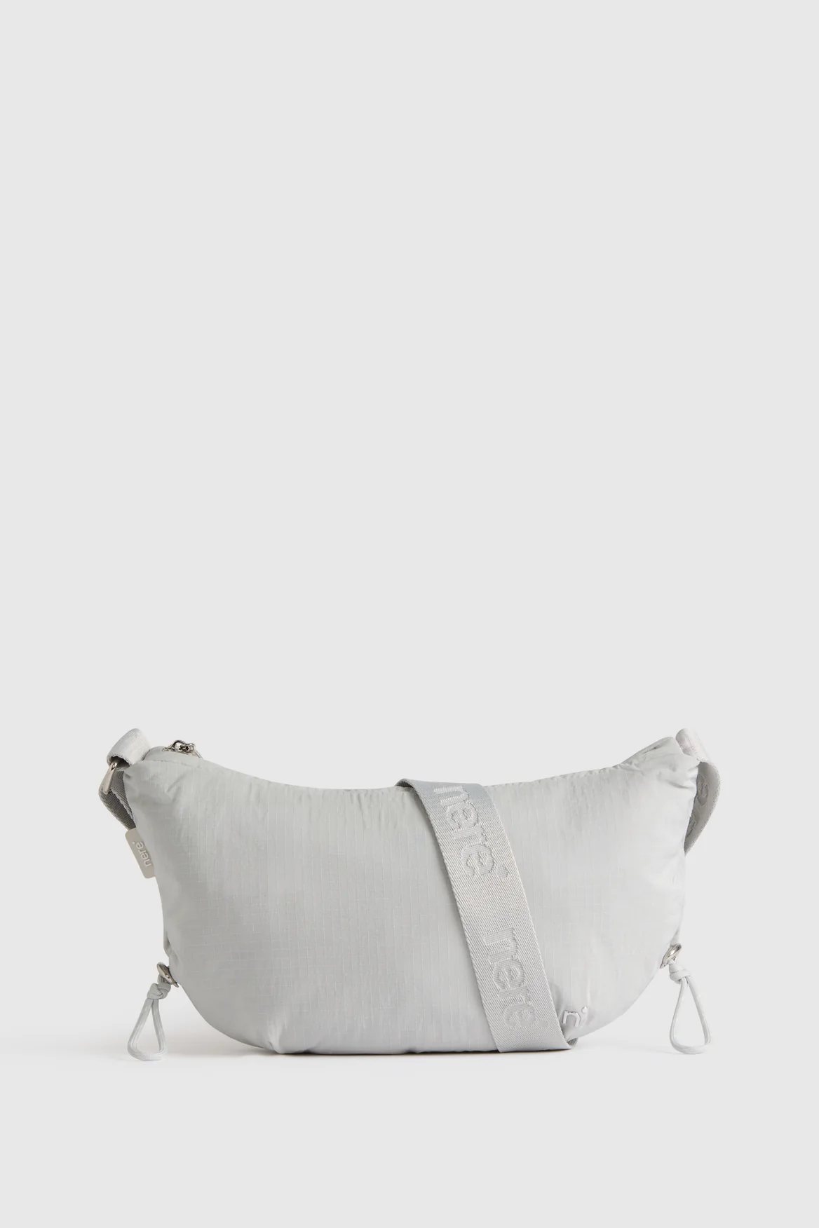 n.motion Crescent Sling Bag